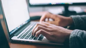Someone using a laptop